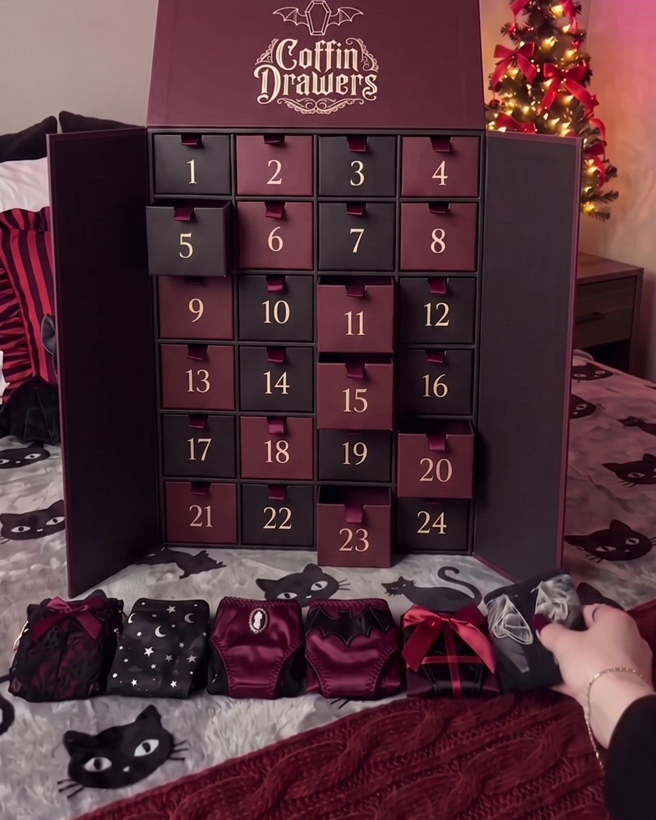 Drawers pulled open with thongs laid out in a row