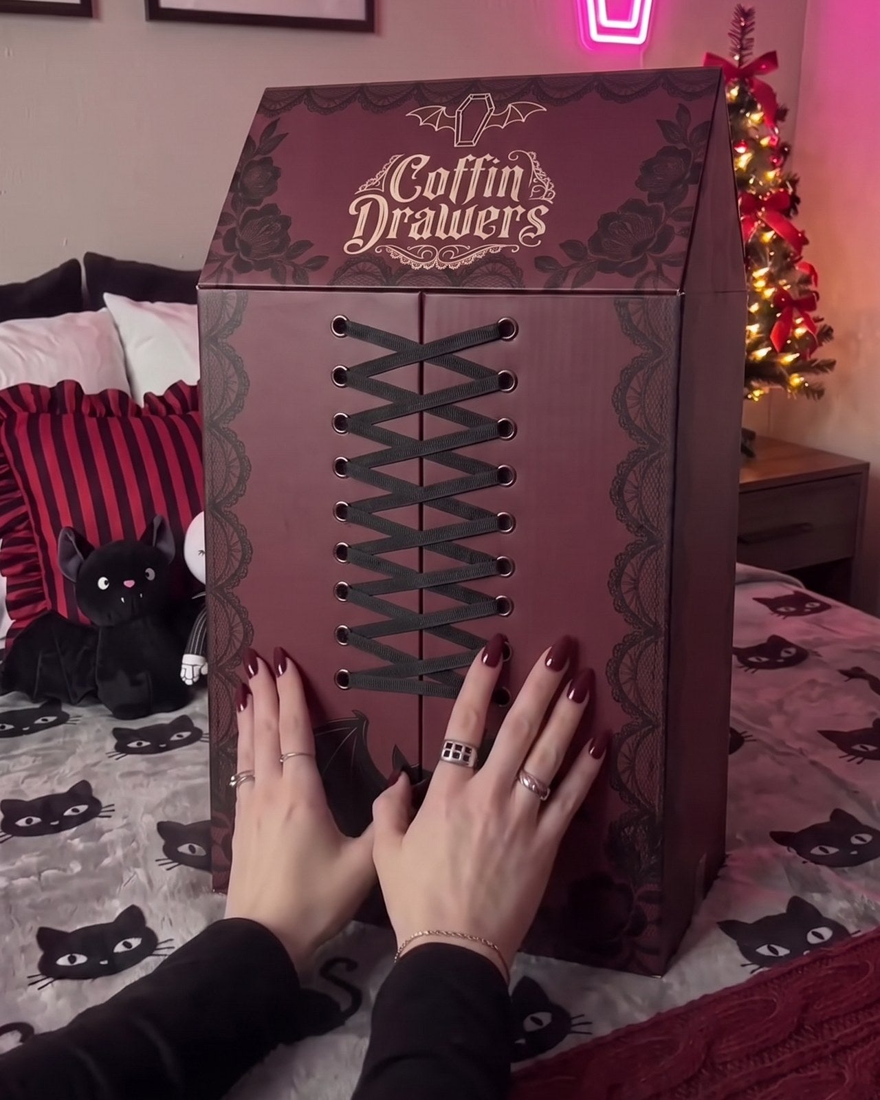 Hands on the laced front of the closed calendar